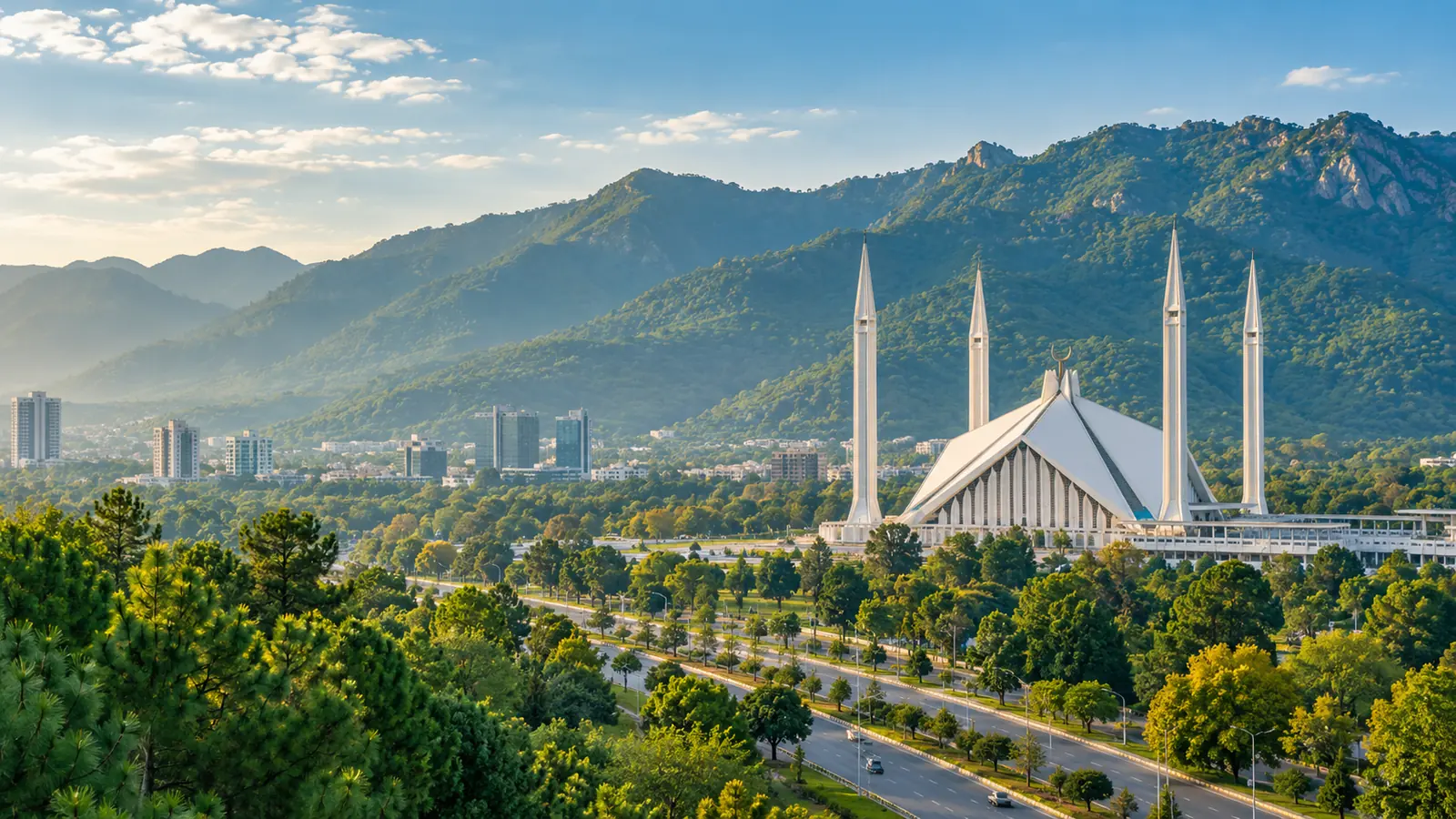 Faisal Mosque and the Margalla Hills above green, tree-lined Islamabad
